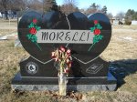 #32 - Supreme Black - An all polished double heart monument with colored shaped carved roses